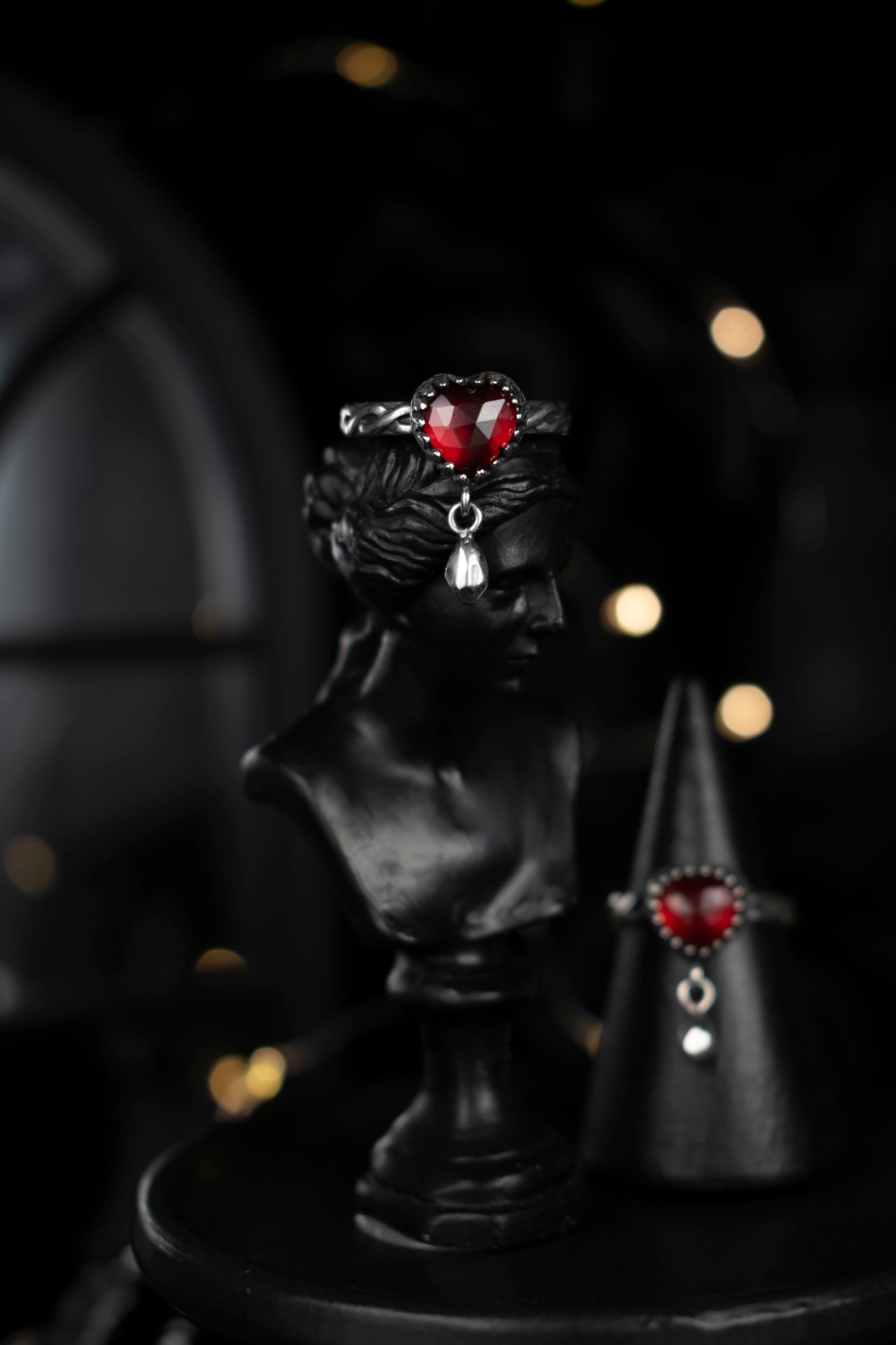 EKRJ1019 Sterling Silver Ring with Heart Shaped Natural Garnet and Dangling Drop Detail