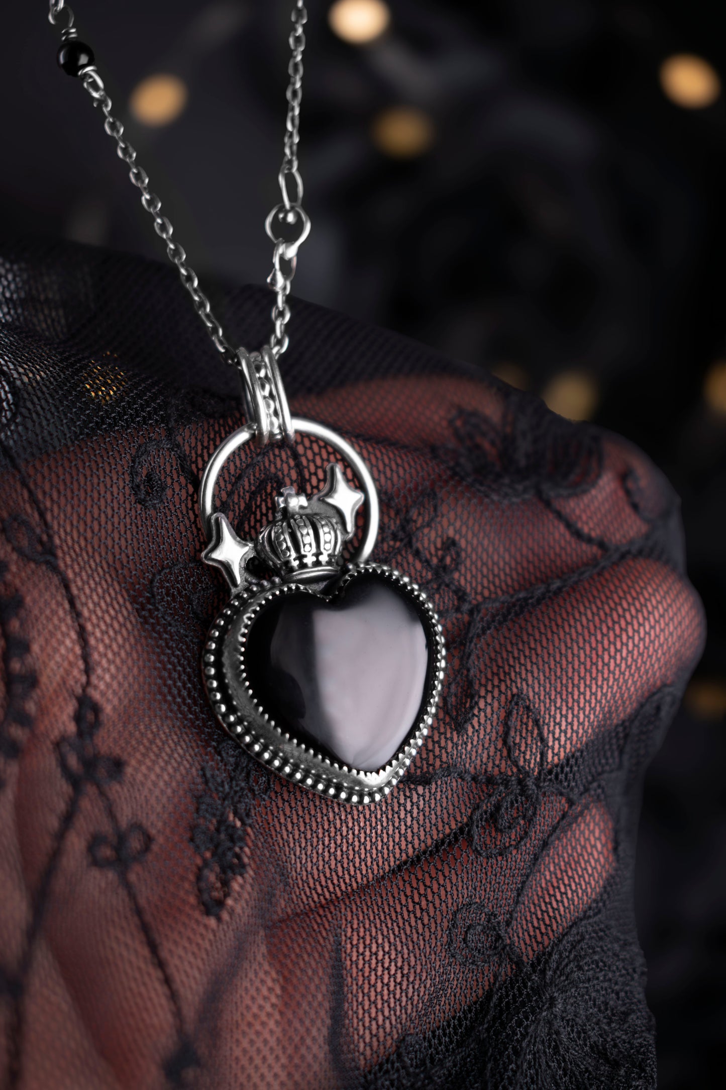 EKRJ1131 The Enchanted Noir Heart: One-of-a-Kind Sterling Silver & Black Onyx Crowned Necklace